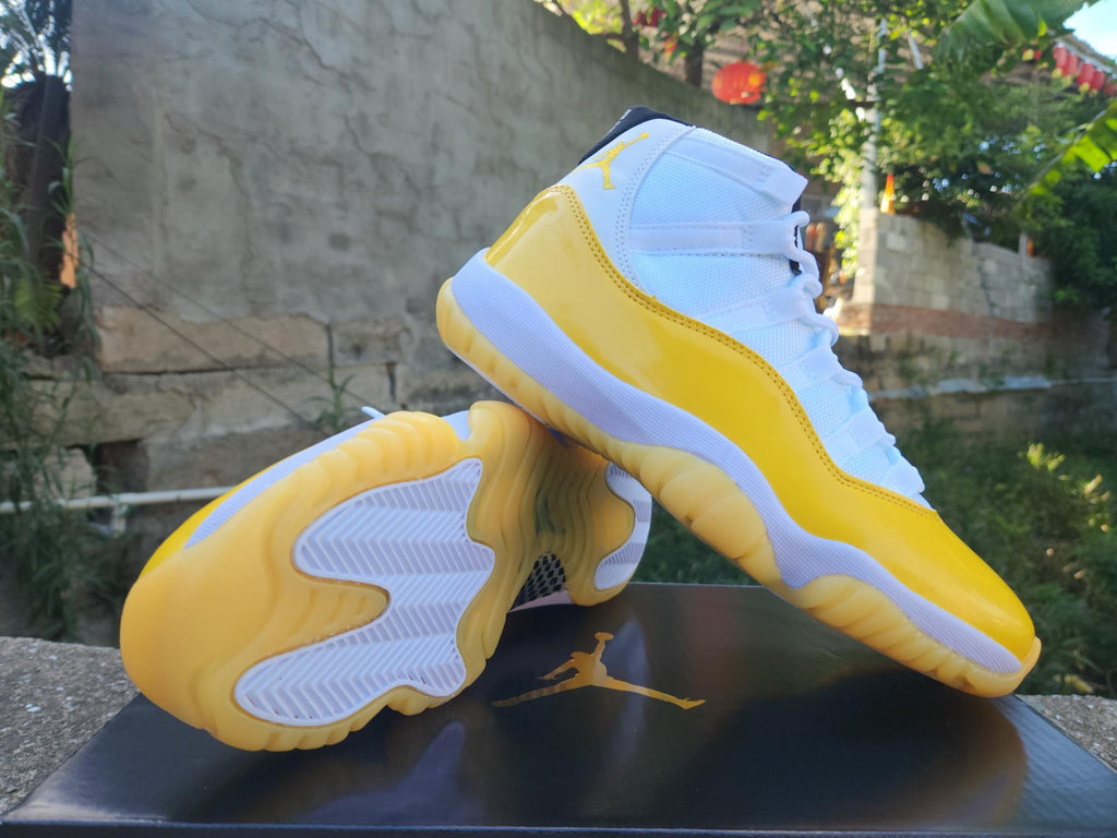 Air Jordan 11 White Yellow Sneakers
