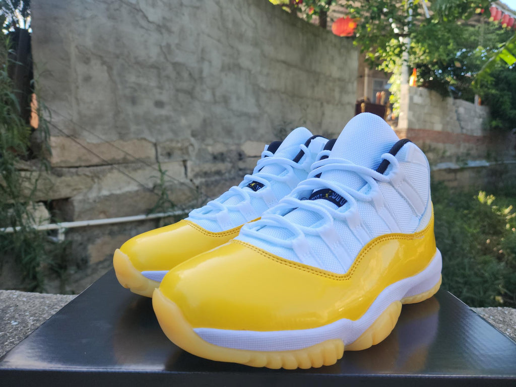 Air Jordan 11 White Yellow Sneakers