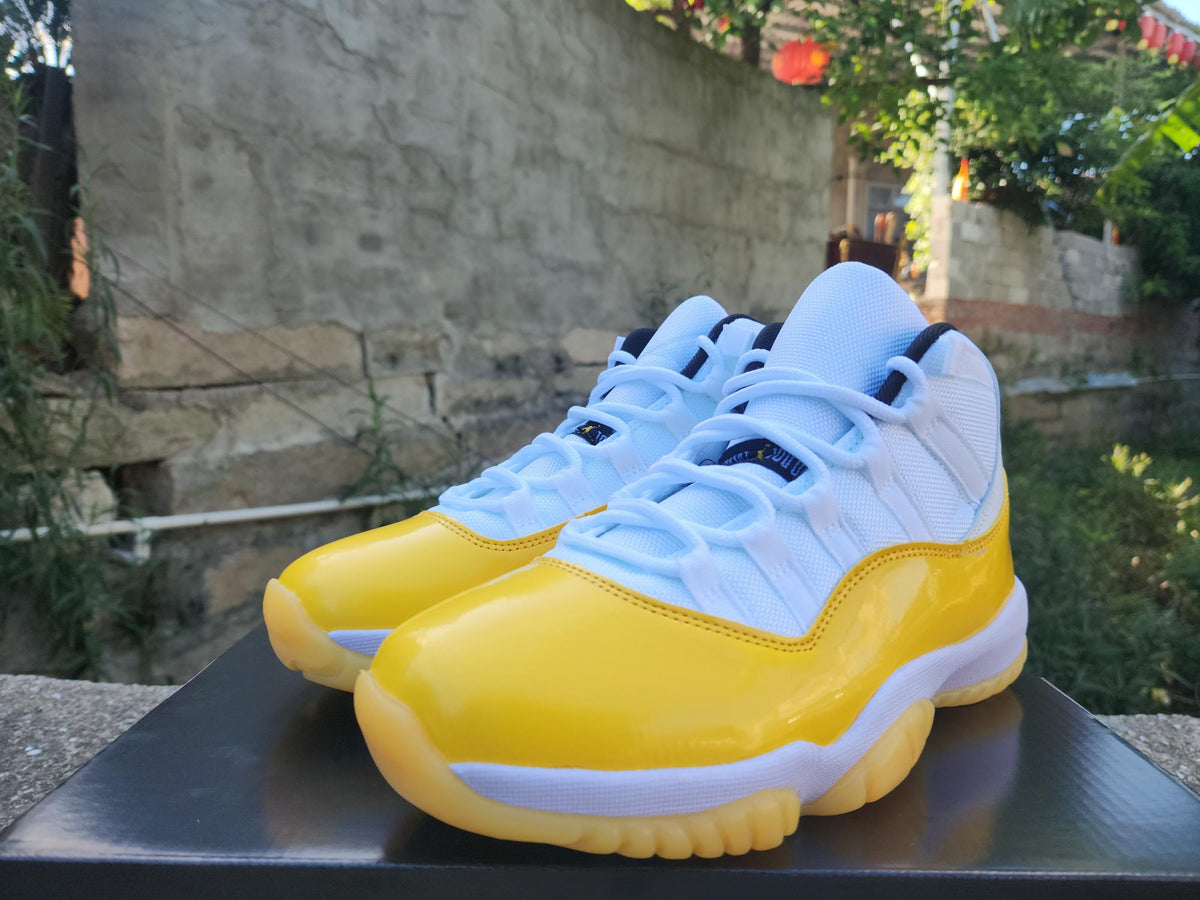 Air Jordan 11 White Yellow Sneakers