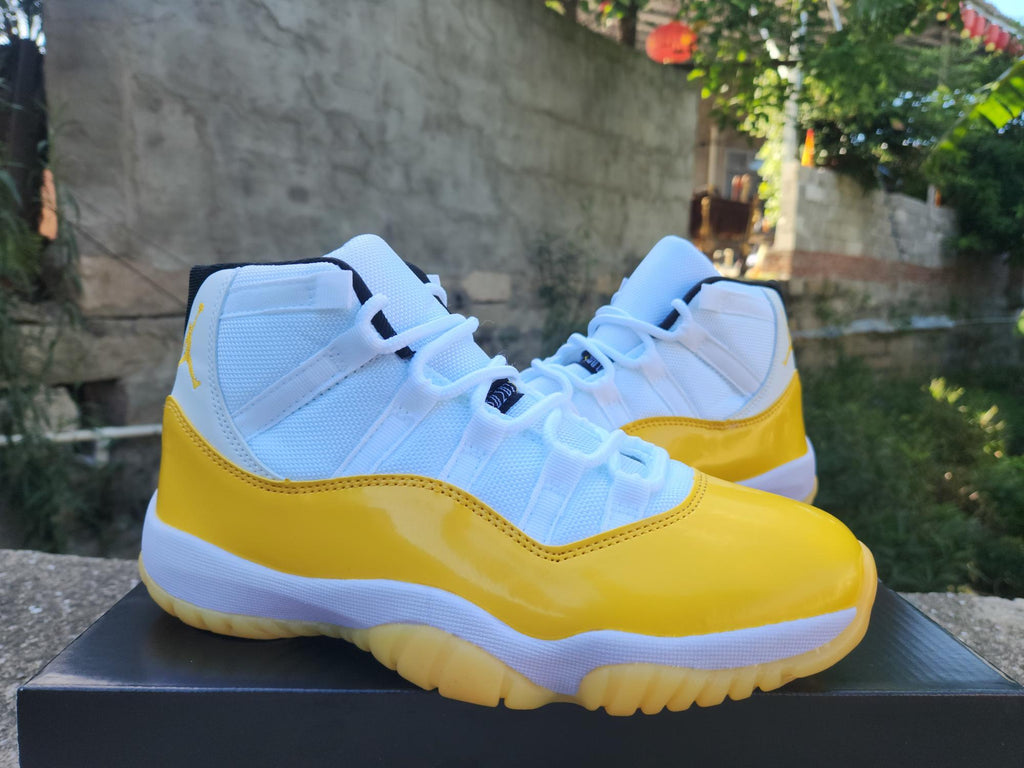 Air Jordan 11 White Yellow Sneakers