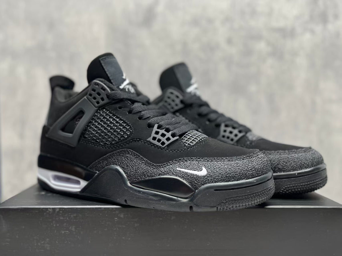 Air Jordan 4 Retro Black Motorsport Sneakers